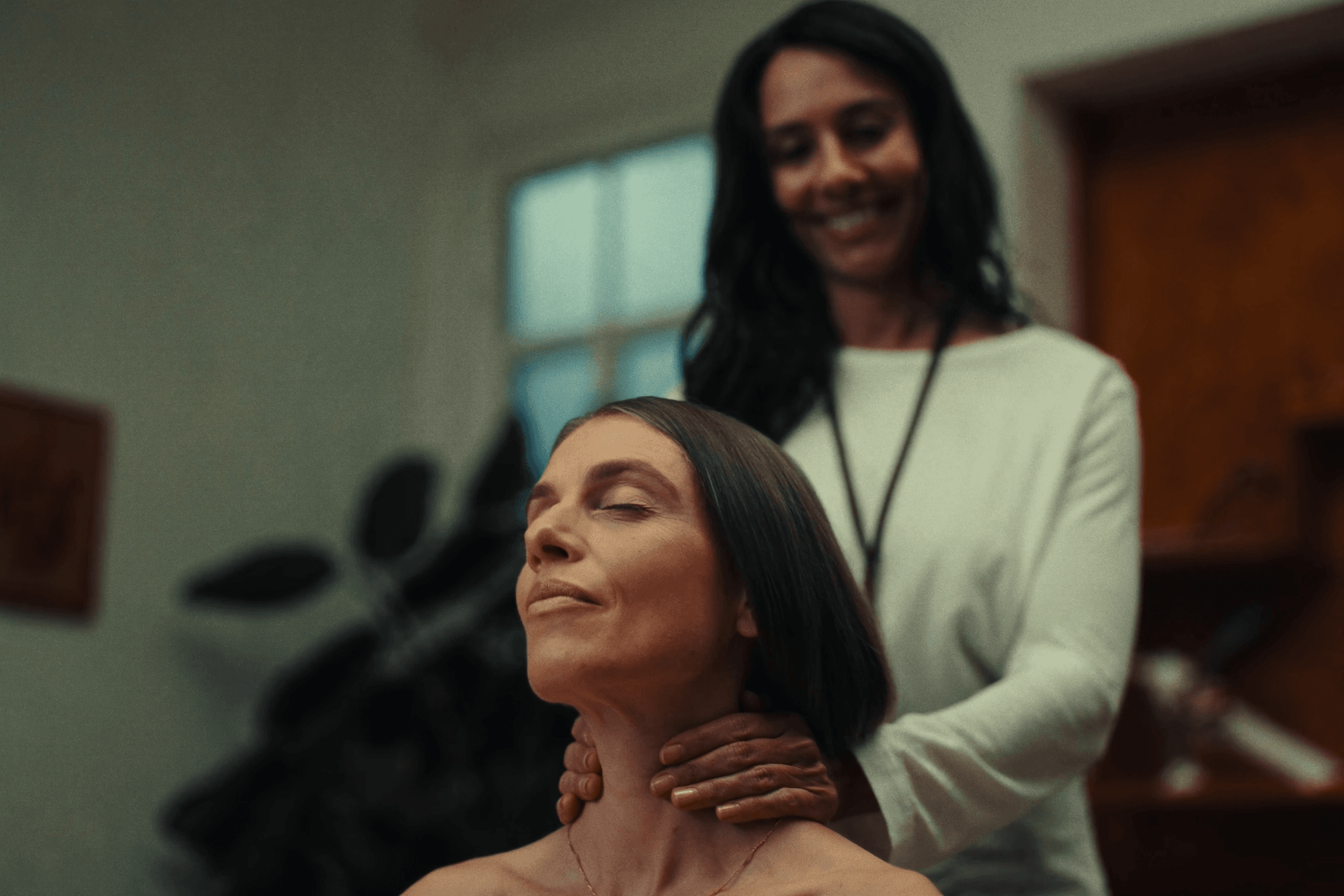 Woman having a regular relaxing shoulder massage to help manage everyday stress